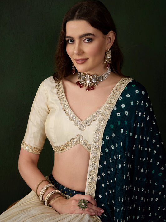 Offwhite Lehenga Choli with Petrol Blue Bandhani Dupatta