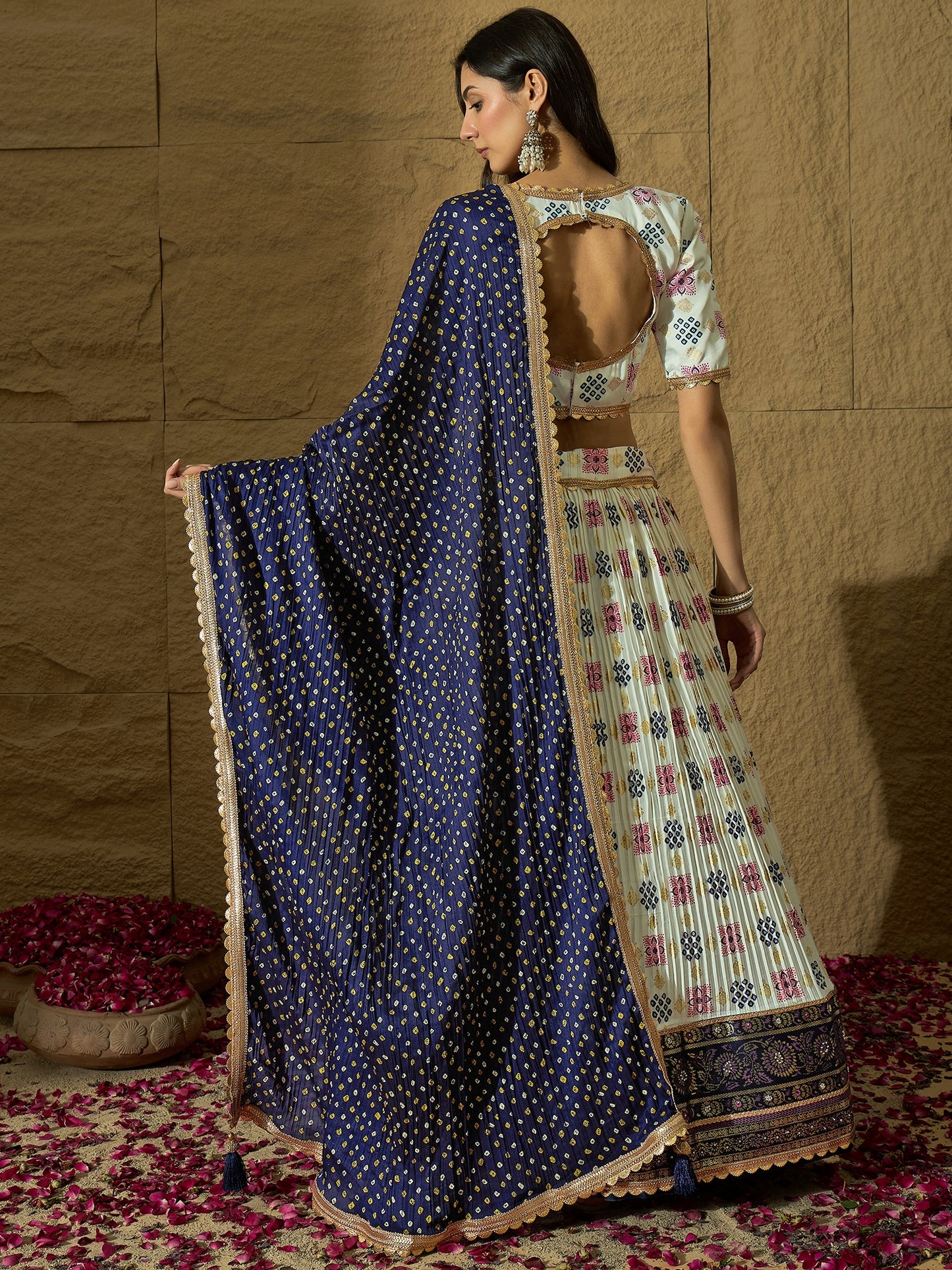 White Ajarakh Silk Lehenga choli with Navy Blue Bandhej print Dupatta