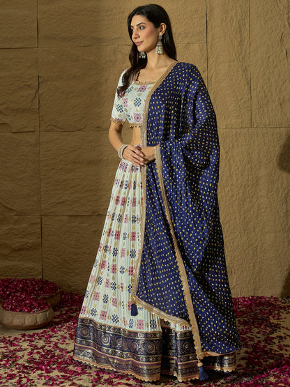White Ajarakh Silk Lehenga choli with Navy Blue Bandhej print Dupatta
