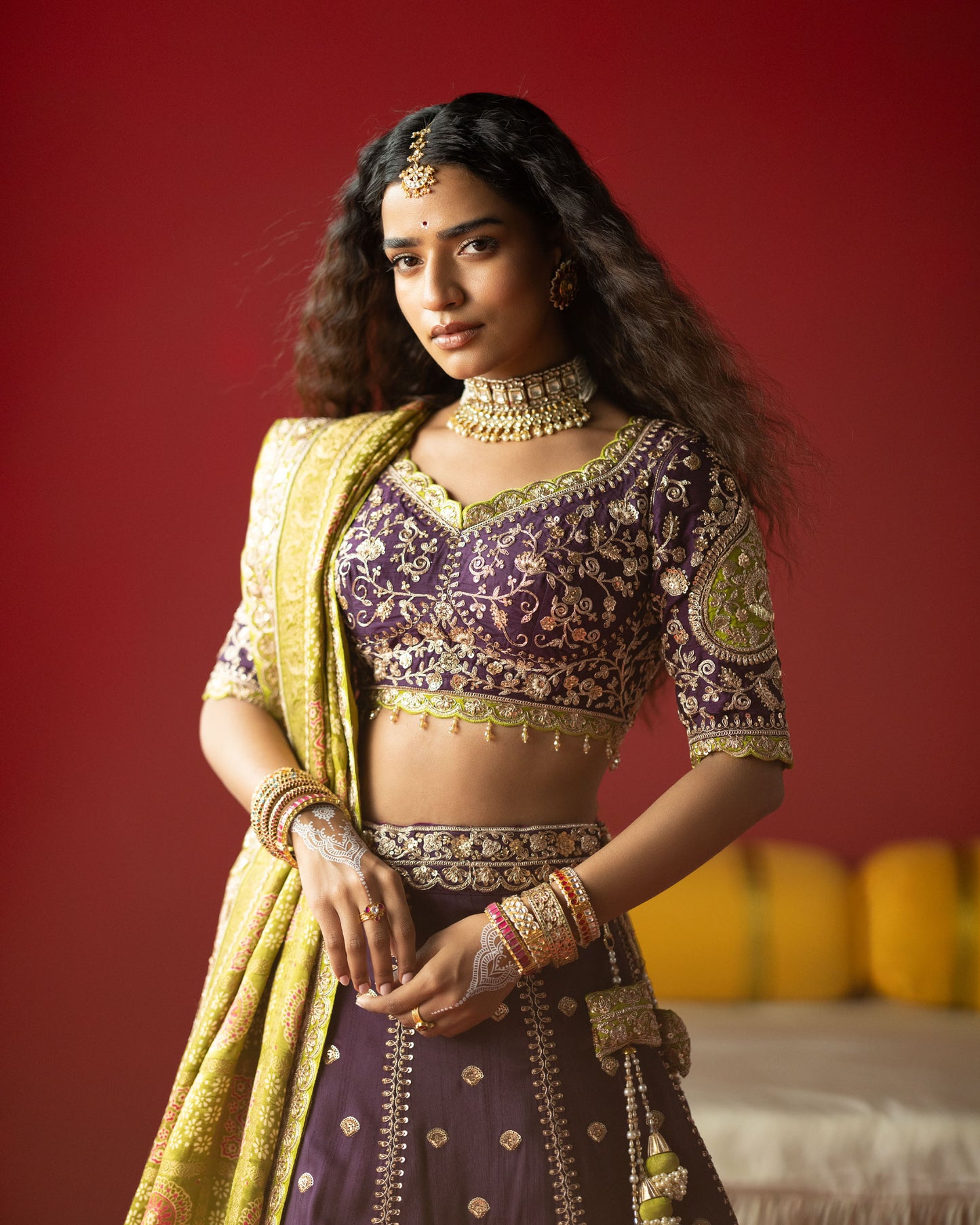purple lehenga with pistachio-green ajarakh duppata