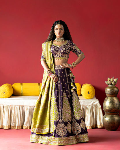 purple lehenga with pistachio-green ajarakh duppata