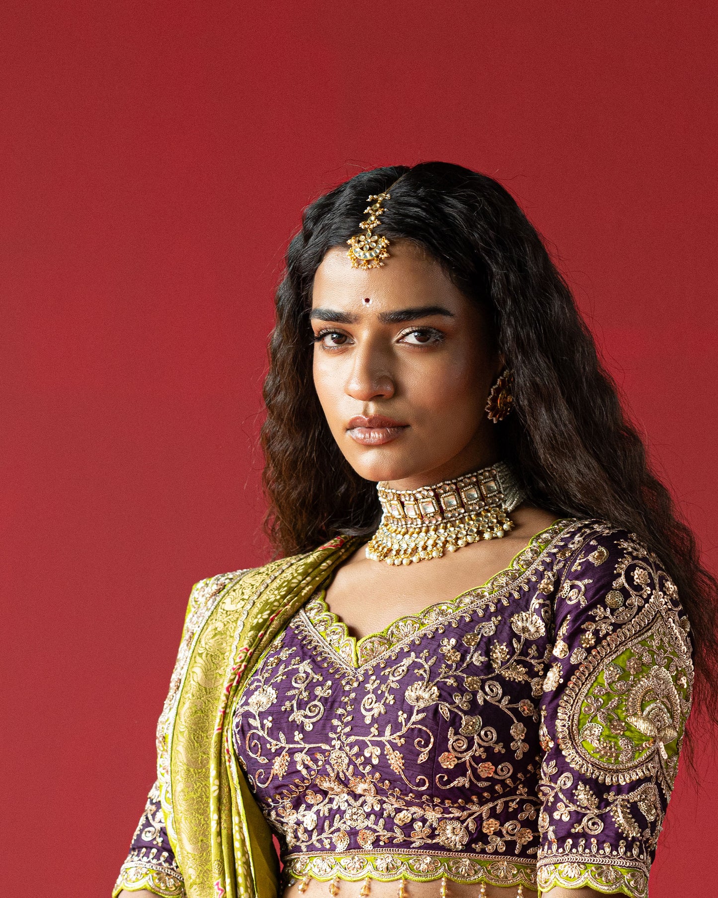 purple lehenga with pistachio-green ajarakh duppata