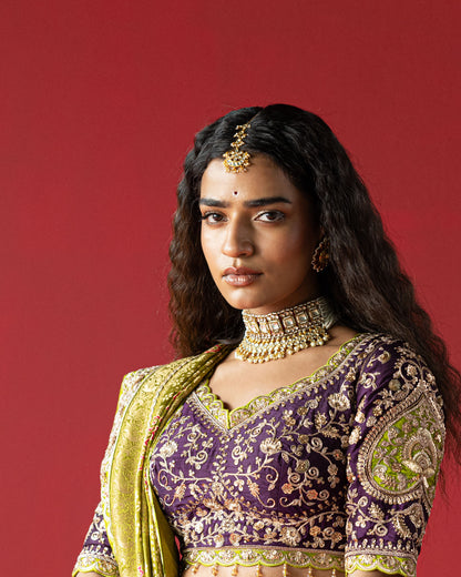 purple lehenga with pistachio-green ajarakh duppata