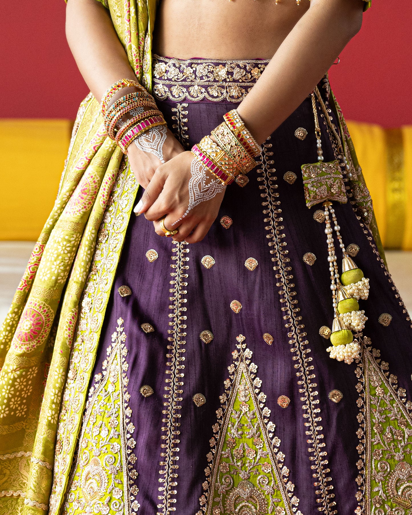 purple lehenga with pistachio-green ajarakh duppata