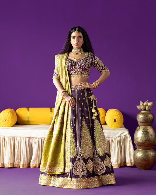 purple lehenga with pistachio-green ajarakh duppata