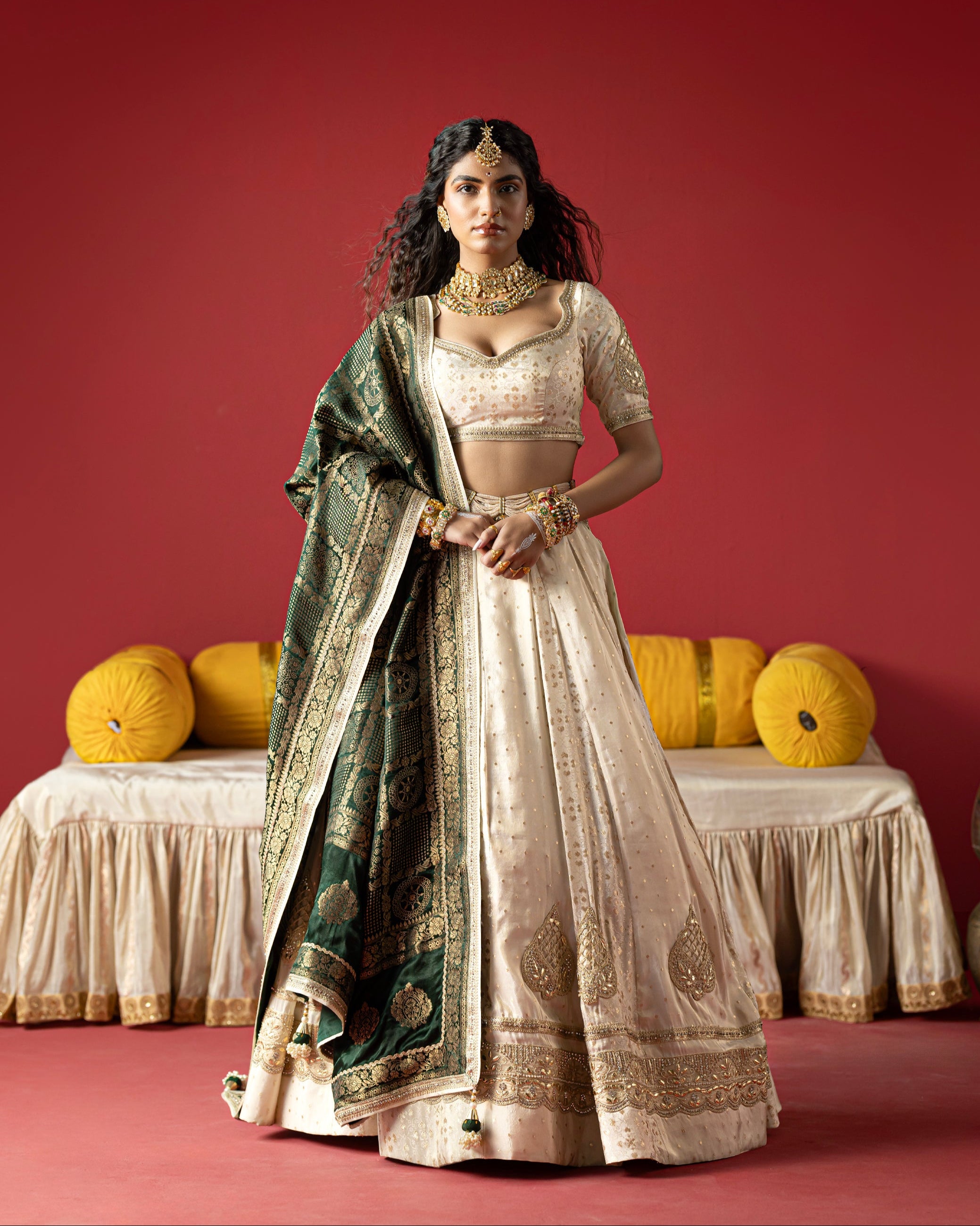 Woman in traditional outfit with a red background