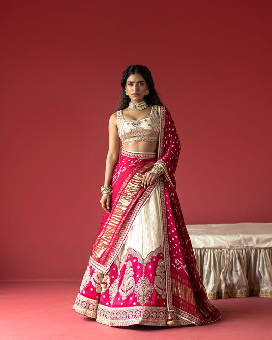 Offwhite rani jari tissue jeq. lehenga with rani bandhej duppata